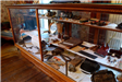 Antique items in display case
