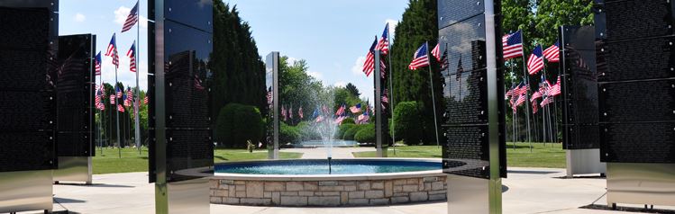 Memorial surround by flags