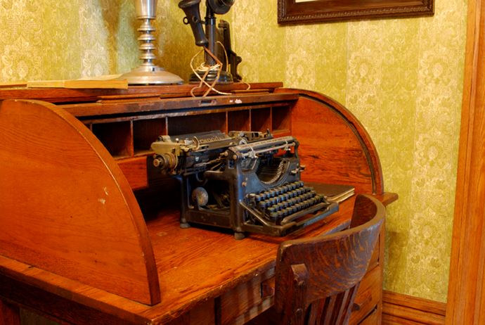 Typewriter on wooden desk